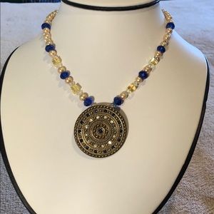Medallion pendant necklace